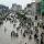 TOPSHOT - People wade through a flooded street after heavy rainfall in Karachi on August 19, 2025. (Photo by Asif HASSAN / AFP)